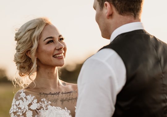 • “Bride and groom standing hand in hand outside Runa Farm’s rustic stone barn – a perfect Durham wedding venue.” • “Candid wedding moment at Runa Farm – newlyweds laughing together under twinkling lights.” • “Elegant boho wedding dress at Runa Farm – bride posing against the venue’s countryside backdrop.” • “Runa Farm wedding setup – long wooden tables, rustic décor, and soft candlelight for a romantic reception.” • “Sunset wedding portraits at Runa Farm – golden hour glow over the rolling Durham countryside.” • “Stylish groom at Runa Farm – a modern take on rustic wedding fashion.” • “The moment they said ‘I do’ – bride and groom exchanging vows in Runa Farm’s barn ceremony space.” • “Runa Farm wedding celebrations – guests raising a toast in a beautifully styled barn reception.” • “Newlyweds sharing their first dance at Runa Farm – a magical moment under fairy lights.” • “Fun wedding party portraits at Runa Farm – bridesmaids and groomsmen celebrating in the countryside.” • “Beautiful wedding bouquet at Runa Farm – dried florals, soft pastels, and rustic charm.” • “Relaxed wedding morning at Runa Farm – bride enjoying a quiet moment before the ceremony.” • “Outdoor wedding drinks reception at Runa Farm – couples and guests enjoying the sunshine and countryside views.” • “Romantic countryside wedding at Runa Farm – couple walking through lush fields at sunset.” • “Runa Farm wedding cake – elegant design with dried flowers and a rustic-luxe finish.” • “Bridal party getting ready at Runa Farm – laughter, champagne, and the perfect pre-wedding moments.” • “Emotional groom watching his bride walk down the aisle at Runa Farm’s intimate barn setting.” • “Boho-inspired wedding styling at Runa Farm – warm tones, pampas grass, and rustic wooden details.” • “Confetti moment at Runa Farm – bride and groom celebrating with family and friends in a joyful shower of petals.” • “Romantic wedding reception at Runa Farm – candlelit tables, rustic beams, and a warm, cozy atmosphere.” • “Bride and groom sharing a private moment outside Runa Farm’s stunning stone architecture.” • “Wedding guests enjoying a relaxed al fresco drinks reception at Runa Farm’s outdoor courtyard.” • “Rustic barn wedding inspiration at Runa Farm – dreamy styling with fairy lights and natural textures.” • “Newlyweds embracing outside Runa Farm’s picturesque countryside backdrop – the perfect Durham wedding setting.” • “Groom waiting at the altar at Runa Farm – the perfect rustic wedding venue for an intimate ceremony.” • “Bridal portraits at Runa Farm – timeless elegance meets countryside charm.” • “Golden hour wedding photography at Runa Farm – romantic sunset portraits of the newlyweds.” • “Sparkler exit at Runa Farm – magical wedding send-off under a starry North East sky.” • “Bride and groom sharing a relaxed moment by Runa Farm’s rustic wooden gates.” • “Romantic first look at Runa Farm – groom’s emotional reaction to seeing his bride.” • “Natural wedding photography at Runa Farm – capturing authentic moments of love and joy.” • “Bridal details at Runa Farm – lace wedding gown, delicate florals, and rustic-chic styling.” • “Outdoor wedding portraits at Runa Farm – capturing the couple in a breathtaking countryside setting.” • “Guests celebrating at Runa Farm wedding reception – joyful candid moments on the dance floor.” • “Modern rustic wedding décor at Runa Farm – beautifully styled tables with earthy tones and fresh flowers.” • “Newlyweds enjoying a quiet moment at Runa Farm’s scenic outdoor spaces.” • “Groom buttoning up his suit before the ceremony at Runa Farm – stylish and relaxed wedding morning.” • “Wedding party group shots at Runa Farm – fun, natural, and full of personality.” • “Intimate wedding dinner setup at Runa Farm – romantic lighting and beautifully arranged tables.”