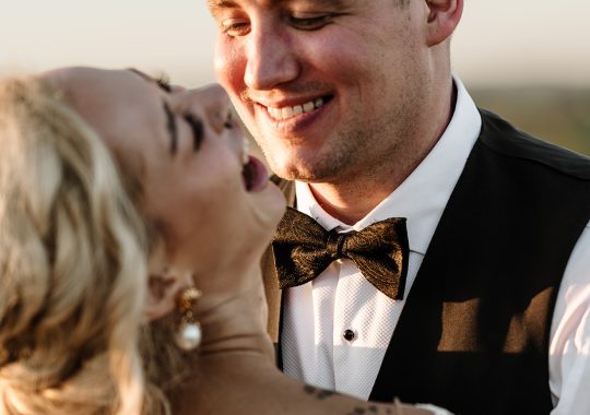 • “Bride and groom standing hand in hand outside Runa Farm’s rustic stone barn – a perfect Durham wedding venue.” • “Candid wedding moment at Runa Farm – newlyweds laughing together under twinkling lights.” • “Elegant boho wedding dress at Runa Farm – bride posing against the venue’s countryside backdrop.” • “Runa Farm wedding setup – long wooden tables, rustic décor, and soft candlelight for a romantic reception.” • “Sunset wedding portraits at Runa Farm – golden hour glow over the rolling Durham countryside.” • “Stylish groom at Runa Farm – a modern take on rustic wedding fashion.” • “The moment they said ‘I do’ – bride and groom exchanging vows in Runa Farm’s barn ceremony space.” • “Runa Farm wedding celebrations – guests raising a toast in a beautifully styled barn reception.” • “Newlyweds sharing their first dance at Runa Farm – a magical moment under fairy lights.” • “Fun wedding party portraits at Runa Farm – bridesmaids and groomsmen celebrating in the countryside.” • “Beautiful wedding bouquet at Runa Farm – dried florals, soft pastels, and rustic charm.” • “Relaxed wedding morning at Runa Farm – bride enjoying a quiet moment before the ceremony.” • “Outdoor wedding drinks reception at Runa Farm – couples and guests enjoying the sunshine and countryside views.” • “Romantic countryside wedding at Runa Farm – couple walking through lush fields at sunset.” • “Runa Farm wedding cake – elegant design with dried flowers and a rustic-luxe finish.” • “Bridal party getting ready at Runa Farm – laughter, champagne, and the perfect pre-wedding moments.” • “Emotional groom watching his bride walk down the aisle at Runa Farm’s intimate barn setting.” • “Boho-inspired wedding styling at Runa Farm – warm tones, pampas grass, and rustic wooden details.” • “Confetti moment at Runa Farm – bride and groom celebrating with family and friends in a joyful shower of petals.” • “Romantic wedding reception at Runa Farm – candlelit tables, rustic beams, and a warm, cozy atmosphere.” • “Bride and groom sharing a private moment outside Runa Farm’s stunning stone architecture.” • “Wedding guests enjoying a relaxed al fresco drinks reception at Runa Farm’s outdoor courtyard.” • “Rustic barn wedding inspiration at Runa Farm – dreamy styling with fairy lights and natural textures.” • “Newlyweds embracing outside Runa Farm’s picturesque countryside backdrop – the perfect Durham wedding setting.” • “Groom waiting at the altar at Runa Farm – the perfect rustic wedding venue for an intimate ceremony.” • “Bridal portraits at Runa Farm – timeless elegance meets countryside charm.” • “Golden hour wedding photography at Runa Farm – romantic sunset portraits of the newlyweds.” • “Sparkler exit at Runa Farm – magical wedding send-off under a starry North East sky.” • “Bride and groom sharing a relaxed moment by Runa Farm’s rustic wooden gates.” • “Romantic first look at Runa Farm – groom’s emotional reaction to seeing his bride.” • “Natural wedding photography at Runa Farm – capturing authentic moments of love and joy.” • “Bridal details at Runa Farm – lace wedding gown, delicate florals, and rustic-chic styling.” • “Outdoor wedding portraits at Runa Farm – capturing the couple in a breathtaking countryside setting.” • “Guests celebrating at Runa Farm wedding reception – joyful candid moments on the dance floor.” • “Modern rustic wedding décor at Runa Farm – beautifully styled tables with earthy tones and fresh flowers.” • “Newlyweds enjoying a quiet moment at Runa Farm’s scenic outdoor spaces.” • “Groom buttoning up his suit before the ceremony at Runa Farm – stylish and relaxed wedding morning.” • “Wedding party group shots at Runa Farm – fun, natural, and full of personality.” • “Intimate wedding dinner setup at Runa Farm – romantic lighting and beautifully arranged tables.”