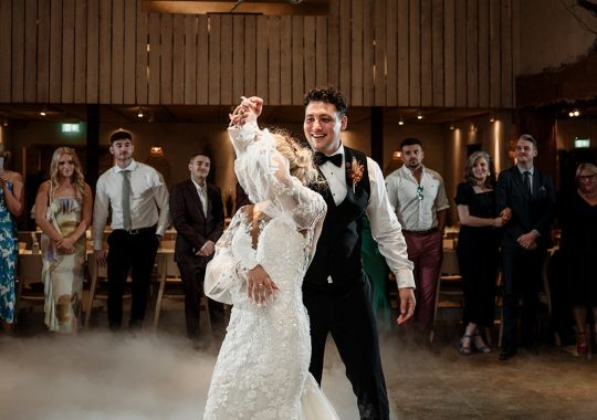 • “Bride and groom standing hand in hand outside Runa Farm’s rustic stone barn – a perfect Durham wedding venue.” • “Candid wedding moment at Runa Farm – newlyweds laughing together under twinkling lights.” • “Elegant boho wedding dress at Runa Farm – bride posing against the venue’s countryside backdrop.” • “Runa Farm wedding setup – long wooden tables, rustic décor, and soft candlelight for a romantic reception.” • “Sunset wedding portraits at Runa Farm – golden hour glow over the rolling Durham countryside.” • “Stylish groom at Runa Farm – a modern take on rustic wedding fashion.” • “The moment they said ‘I do’ – bride and groom exchanging vows in Runa Farm’s barn ceremony space.” • “Runa Farm wedding celebrations – guests raising a toast in a beautifully styled barn reception.” • “Newlyweds sharing their first dance at Runa Farm – a magical moment under fairy lights.” • “Fun wedding party portraits at Runa Farm – bridesmaids and groomsmen celebrating in the countryside.” • “Beautiful wedding bouquet at Runa Farm – dried florals, soft pastels, and rustic charm.” • “Relaxed wedding morning at Runa Farm – bride enjoying a quiet moment before the ceremony.” • “Outdoor wedding drinks reception at Runa Farm – couples and guests enjoying the sunshine and countryside views.” • “Romantic countryside wedding at Runa Farm – couple walking through lush fields at sunset.” • “Runa Farm wedding cake – elegant design with dried flowers and a rustic-luxe finish.” • “Bridal party getting ready at Runa Farm – laughter, champagne, and the perfect pre-wedding moments.” • “Emotional groom watching his bride walk down the aisle at Runa Farm’s intimate barn setting.” • “Boho-inspired wedding styling at Runa Farm – warm tones, pampas grass, and rustic wooden details.” • “Confetti moment at Runa Farm – bride and groom celebrating with family and friends in a joyful shower of petals.” • “Romantic wedding reception at Runa Farm – candlelit tables, rustic beams, and a warm, cozy atmosphere.” • “Bride and groom sharing a private moment outside Runa Farm’s stunning stone architecture.” • “Wedding guests enjoying a relaxed al fresco drinks reception at Runa Farm’s outdoor courtyard.” • “Rustic barn wedding inspiration at Runa Farm – dreamy styling with fairy lights and natural textures.” • “Newlyweds embracing outside Runa Farm’s picturesque countryside backdrop – the perfect Durham wedding setting.” • “Groom waiting at the altar at Runa Farm – the perfect rustic wedding venue for an intimate ceremony.” • “Bridal portraits at Runa Farm – timeless elegance meets countryside charm.” • “Golden hour wedding photography at Runa Farm – romantic sunset portraits of the newlyweds.” • “Sparkler exit at Runa Farm – magical wedding send-off under a starry North East sky.” • “Bride and groom sharing a relaxed moment by Runa Farm’s rustic wooden gates.” • “Romantic first look at Runa Farm – groom’s emotional reaction to seeing his bride.” • “Natural wedding photography at Runa Farm – capturing authentic moments of love and joy.” • “Bridal details at Runa Farm – lace wedding gown, delicate florals, and rustic-chic styling.” • “Outdoor wedding portraits at Runa Farm – capturing the couple in a breathtaking countryside setting.” • “Guests celebrating at Runa Farm wedding reception – joyful candid moments on the dance floor.” • “Modern rustic wedding décor at Runa Farm – beautifully styled tables with earthy tones and fresh flowers.” • “Newlyweds enjoying a quiet moment at Runa Farm’s scenic outdoor spaces.” • “Groom buttoning up his suit before the ceremony at Runa Farm – stylish and relaxed wedding morning.” • “Wedding party group shots at Runa Farm – fun, natural, and full of personality.” • “Intimate wedding dinner setup at Runa Farm – romantic lighting and beautifully arranged tables.”