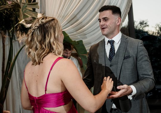 • “Bride and groom standing hand in hand outside Runa Farm’s rustic stone barn – a perfect Durham wedding venue.” • “Candid wedding moment at Runa Farm – newlyweds laughing together under twinkling lights.” • “Elegant boho wedding dress at Runa Farm – bride posing against the venue’s countryside backdrop.” • “Runa Farm wedding setup – long wooden tables, rustic décor, and soft candlelight for a romantic reception.” • “Sunset wedding portraits at Runa Farm – golden hour glow over the rolling Durham countryside.” • “Stylish groom at Runa Farm – a modern take on rustic wedding fashion.” • “The moment they said ‘I do’ – bride and groom exchanging vows in Runa Farm’s barn ceremony space.” • “Runa Farm wedding celebrations – guests raising a toast in a beautifully styled barn reception.” • “Newlyweds sharing their first dance at Runa Farm – a magical moment under fairy lights.” • “Fun wedding party portraits at Runa Farm – bridesmaids and groomsmen celebrating in the countryside.” • “Beautiful wedding bouquet at Runa Farm – dried florals, soft pastels, and rustic charm.” • “Relaxed wedding morning at Runa Farm – bride enjoying a quiet moment before the ceremony.” • “Outdoor wedding drinks reception at Runa Farm – couples and guests enjoying the sunshine and countryside views.” • “Romantic countryside wedding at Runa Farm – couple walking through lush fields at sunset.” • “Runa Farm wedding cake – elegant design with dried flowers and a rustic-luxe finish.” • “Bridal party getting ready at Runa Farm – laughter, champagne, and the perfect pre-wedding moments.” • “Emotional groom watching his bride walk down the aisle at Runa Farm’s intimate barn setting.” • “Boho-inspired wedding styling at Runa Farm – warm tones, pampas grass, and rustic wooden details.” • “Confetti moment at Runa Farm – bride and groom celebrating with family and friends in a joyful shower of petals.” • “Romantic wedding reception at Runa Farm – candlelit tables, rustic beams, and a warm, cozy atmosphere.” • “Bride and groom sharing a private moment outside Runa Farm’s stunning stone architecture.” • “Wedding guests enjoying a relaxed al fresco drinks reception at Runa Farm’s outdoor courtyard.” • “Rustic barn wedding inspiration at Runa Farm – dreamy styling with fairy lights and natural textures.” • “Newlyweds embracing outside Runa Farm’s picturesque countryside backdrop – the perfect Durham wedding setting.” • “Groom waiting at the altar at Runa Farm – the perfect rustic wedding venue for an intimate ceremony.” • “Bridal portraits at Runa Farm – timeless elegance meets countryside charm.” • “Golden hour wedding photography at Runa Farm – romantic sunset portraits of the newlyweds.” • “Sparkler exit at Runa Farm – magical wedding send-off under a starry North East sky.” • “Bride and groom sharing a relaxed moment by Runa Farm’s rustic wooden gates.” • “Romantic first look at Runa Farm – groom’s emotional reaction to seeing his bride.” • “Natural wedding photography at Runa Farm – capturing authentic moments of love and joy.” • “Bridal details at Runa Farm – lace wedding gown, delicate florals, and rustic-chic styling.” • “Outdoor wedding portraits at Runa Farm – capturing the couple in a breathtaking countryside setting.” • “Guests celebrating at Runa Farm wedding reception – joyful candid moments on the dance floor.” • “Modern rustic wedding décor at Runa Farm – beautifully styled tables with earthy tones and fresh flowers.” • “Newlyweds enjoying a quiet moment at Runa Farm’s scenic outdoor spaces.” • “Groom buttoning up his suit before the ceremony at Runa Farm – stylish and relaxed wedding morning.” • “Wedding party group shots at Runa Farm – fun, natural, and full of personality.” • “Intimate wedding dinner setup at Runa Farm – romantic lighting and beautifully arranged tables.”