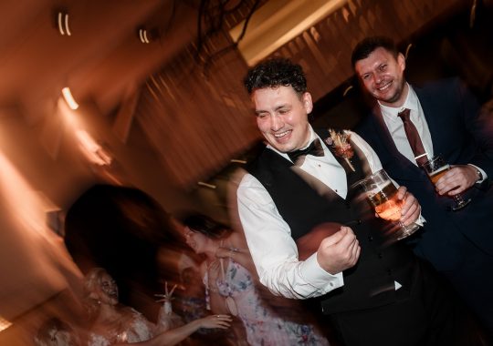 • “Bride and groom standing hand in hand outside Runa Farm’s rustic stone barn – a perfect Durham wedding venue.” • “Candid wedding moment at Runa Farm – newlyweds laughing together under twinkling lights.” • “Elegant boho wedding dress at Runa Farm – bride posing against the venue’s countryside backdrop.” • “Runa Farm wedding setup – long wooden tables, rustic décor, and soft candlelight for a romantic reception.” • “Sunset wedding portraits at Runa Farm – golden hour glow over the rolling Durham countryside.” • “Stylish groom at Runa Farm – a modern take on rustic wedding fashion.” • “The moment they said ‘I do’ – bride and groom exchanging vows in Runa Farm’s barn ceremony space.” • “Runa Farm wedding celebrations – guests raising a toast in a beautifully styled barn reception.” • “Newlyweds sharing their first dance at Runa Farm – a magical moment under fairy lights.” • “Fun wedding party portraits at Runa Farm – bridesmaids and groomsmen celebrating in the countryside.” • “Beautiful wedding bouquet at Runa Farm – dried florals, soft pastels, and rustic charm.” • “Relaxed wedding morning at Runa Farm – bride enjoying a quiet moment before the ceremony.” • “Outdoor wedding drinks reception at Runa Farm – couples and guests enjoying the sunshine and countryside views.” • “Romantic countryside wedding at Runa Farm – couple walking through lush fields at sunset.” • “Runa Farm wedding cake – elegant design with dried flowers and a rustic-luxe finish.” • “Bridal party getting ready at Runa Farm – laughter, champagne, and the perfect pre-wedding moments.” • “Emotional groom watching his bride walk down the aisle at Runa Farm’s intimate barn setting.” • “Boho-inspired wedding styling at Runa Farm – warm tones, pampas grass, and rustic wooden details.” • “Confetti moment at Runa Farm – bride and groom celebrating with family and friends in a joyful shower of petals.” • “Romantic wedding reception at Runa Farm – candlelit tables, rustic beams, and a warm, cozy atmosphere.” • “Bride and groom sharing a private moment outside Runa Farm’s stunning stone architecture.” • “Wedding guests enjoying a relaxed al fresco drinks reception at Runa Farm’s outdoor courtyard.” • “Rustic barn wedding inspiration at Runa Farm – dreamy styling with fairy lights and natural textures.” • “Newlyweds embracing outside Runa Farm’s picturesque countryside backdrop – the perfect Durham wedding setting.” • “Groom waiting at the altar at Runa Farm – the perfect rustic wedding venue for an intimate ceremony.” • “Bridal portraits at Runa Farm – timeless elegance meets countryside charm.” • “Golden hour wedding photography at Runa Farm – romantic sunset portraits of the newlyweds.” • “Sparkler exit at Runa Farm – magical wedding send-off under a starry North East sky.” • “Bride and groom sharing a relaxed moment by Runa Farm’s rustic wooden gates.” • “Romantic first look at Runa Farm – groom’s emotional reaction to seeing his bride.” • “Natural wedding photography at Runa Farm – capturing authentic moments of love and joy.” • “Bridal details at Runa Farm – lace wedding gown, delicate florals, and rustic-chic styling.” • “Outdoor wedding portraits at Runa Farm – capturing the couple in a breathtaking countryside setting.” • “Guests celebrating at Runa Farm wedding reception – joyful candid moments on the dance floor.” • “Modern rustic wedding décor at Runa Farm – beautifully styled tables with earthy tones and fresh flowers.” • “Newlyweds enjoying a quiet moment at Runa Farm’s scenic outdoor spaces.” • “Groom buttoning up his suit before the ceremony at Runa Farm – stylish and relaxed wedding morning.” • “Wedding party group shots at Runa Farm – fun, natural, and full of personality.” • “Intimate wedding dinner setup at Runa Farm – romantic lighting and beautifully arranged tables.”