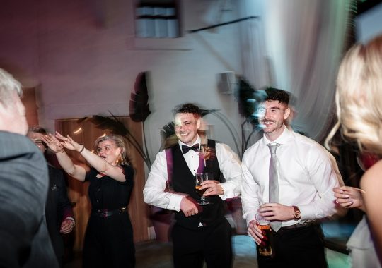 • “Bride and groom standing hand in hand outside Runa Farm’s rustic stone barn – a perfect Durham wedding venue.” • “Candid wedding moment at Runa Farm – newlyweds laughing together under twinkling lights.” • “Elegant boho wedding dress at Runa Farm – bride posing against the venue’s countryside backdrop.” • “Runa Farm wedding setup – long wooden tables, rustic décor, and soft candlelight for a romantic reception.” • “Sunset wedding portraits at Runa Farm – golden hour glow over the rolling Durham countryside.” • “Stylish groom at Runa Farm – a modern take on rustic wedding fashion.” • “The moment they said ‘I do’ – bride and groom exchanging vows in Runa Farm’s barn ceremony space.” • “Runa Farm wedding celebrations – guests raising a toast in a beautifully styled barn reception.” • “Newlyweds sharing their first dance at Runa Farm – a magical moment under fairy lights.” • “Fun wedding party portraits at Runa Farm – bridesmaids and groomsmen celebrating in the countryside.” • “Beautiful wedding bouquet at Runa Farm – dried florals, soft pastels, and rustic charm.” • “Relaxed wedding morning at Runa Farm – bride enjoying a quiet moment before the ceremony.” • “Outdoor wedding drinks reception at Runa Farm – couples and guests enjoying the sunshine and countryside views.” • “Romantic countryside wedding at Runa Farm – couple walking through lush fields at sunset.” • “Runa Farm wedding cake – elegant design with dried flowers and a rustic-luxe finish.” • “Bridal party getting ready at Runa Farm – laughter, champagne, and the perfect pre-wedding moments.” • “Emotional groom watching his bride walk down the aisle at Runa Farm’s intimate barn setting.” • “Boho-inspired wedding styling at Runa Farm – warm tones, pampas grass, and rustic wooden details.” • “Confetti moment at Runa Farm – bride and groom celebrating with family and friends in a joyful shower of petals.” • “Romantic wedding reception at Runa Farm – candlelit tables, rustic beams, and a warm, cozy atmosphere.” • “Bride and groom sharing a private moment outside Runa Farm’s stunning stone architecture.” • “Wedding guests enjoying a relaxed al fresco drinks reception at Runa Farm’s outdoor courtyard.” • “Rustic barn wedding inspiration at Runa Farm – dreamy styling with fairy lights and natural textures.” • “Newlyweds embracing outside Runa Farm’s picturesque countryside backdrop – the perfect Durham wedding setting.” • “Groom waiting at the altar at Runa Farm – the perfect rustic wedding venue for an intimate ceremony.” • “Bridal portraits at Runa Farm – timeless elegance meets countryside charm.” • “Golden hour wedding photography at Runa Farm – romantic sunset portraits of the newlyweds.” • “Sparkler exit at Runa Farm – magical wedding send-off under a starry North East sky.” • “Bride and groom sharing a relaxed moment by Runa Farm’s rustic wooden gates.” • “Romantic first look at Runa Farm – groom’s emotional reaction to seeing his bride.” • “Natural wedding photography at Runa Farm – capturing authentic moments of love and joy.” • “Bridal details at Runa Farm – lace wedding gown, delicate florals, and rustic-chic styling.” • “Outdoor wedding portraits at Runa Farm – capturing the couple in a breathtaking countryside setting.” • “Guests celebrating at Runa Farm wedding reception – joyful candid moments on the dance floor.” • “Modern rustic wedding décor at Runa Farm – beautifully styled tables with earthy tones and fresh flowers.” • “Newlyweds enjoying a quiet moment at Runa Farm’s scenic outdoor spaces.” • “Groom buttoning up his suit before the ceremony at Runa Farm – stylish and relaxed wedding morning.” • “Wedding party group shots at Runa Farm – fun, natural, and full of personality.” • “Intimate wedding dinner setup at Runa Farm – romantic lighting and beautifully arranged tables.”