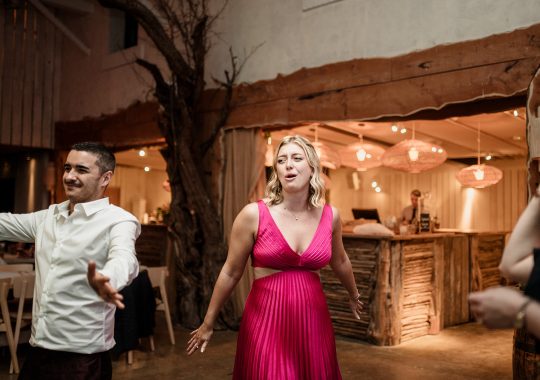 • “Bride and groom standing hand in hand outside Runa Farm’s rustic stone barn – a perfect Durham wedding venue.” • “Candid wedding moment at Runa Farm – newlyweds laughing together under twinkling lights.” • “Elegant boho wedding dress at Runa Farm – bride posing against the venue’s countryside backdrop.” • “Runa Farm wedding setup – long wooden tables, rustic décor, and soft candlelight for a romantic reception.” • “Sunset wedding portraits at Runa Farm – golden hour glow over the rolling Durham countryside.” • “Stylish groom at Runa Farm – a modern take on rustic wedding fashion.” • “The moment they said ‘I do’ – bride and groom exchanging vows in Runa Farm’s barn ceremony space.” • “Runa Farm wedding celebrations – guests raising a toast in a beautifully styled barn reception.” • “Newlyweds sharing their first dance at Runa Farm – a magical moment under fairy lights.” • “Fun wedding party portraits at Runa Farm – bridesmaids and groomsmen celebrating in the countryside.” • “Beautiful wedding bouquet at Runa Farm – dried florals, soft pastels, and rustic charm.” • “Relaxed wedding morning at Runa Farm – bride enjoying a quiet moment before the ceremony.” • “Outdoor wedding drinks reception at Runa Farm – couples and guests enjoying the sunshine and countryside views.” • “Romantic countryside wedding at Runa Farm – couple walking through lush fields at sunset.” • “Runa Farm wedding cake – elegant design with dried flowers and a rustic-luxe finish.” • “Bridal party getting ready at Runa Farm – laughter, champagne, and the perfect pre-wedding moments.” • “Emotional groom watching his bride walk down the aisle at Runa Farm’s intimate barn setting.” • “Boho-inspired wedding styling at Runa Farm – warm tones, pampas grass, and rustic wooden details.” • “Confetti moment at Runa Farm – bride and groom celebrating with family and friends in a joyful shower of petals.” • “Romantic wedding reception at Runa Farm – candlelit tables, rustic beams, and a warm, cozy atmosphere.” • “Bride and groom sharing a private moment outside Runa Farm’s stunning stone architecture.” • “Wedding guests enjoying a relaxed al fresco drinks reception at Runa Farm’s outdoor courtyard.” • “Rustic barn wedding inspiration at Runa Farm – dreamy styling with fairy lights and natural textures.” • “Newlyweds embracing outside Runa Farm’s picturesque countryside backdrop – the perfect Durham wedding setting.” • “Groom waiting at the altar at Runa Farm – the perfect rustic wedding venue for an intimate ceremony.” • “Bridal portraits at Runa Farm – timeless elegance meets countryside charm.” • “Golden hour wedding photography at Runa Farm – romantic sunset portraits of the newlyweds.” • “Sparkler exit at Runa Farm – magical wedding send-off under a starry North East sky.” • “Bride and groom sharing a relaxed moment by Runa Farm’s rustic wooden gates.” • “Romantic first look at Runa Farm – groom’s emotional reaction to seeing his bride.” • “Natural wedding photography at Runa Farm – capturing authentic moments of love and joy.” • “Bridal details at Runa Farm – lace wedding gown, delicate florals, and rustic-chic styling.” • “Outdoor wedding portraits at Runa Farm – capturing the couple in a breathtaking countryside setting.” • “Guests celebrating at Runa Farm wedding reception – joyful candid moments on the dance floor.” • “Modern rustic wedding décor at Runa Farm – beautifully styled tables with earthy tones and fresh flowers.” • “Newlyweds enjoying a quiet moment at Runa Farm’s scenic outdoor spaces.” • “Groom buttoning up his suit before the ceremony at Runa Farm – stylish and relaxed wedding morning.” • “Wedding party group shots at Runa Farm – fun, natural, and full of personality.” • “Intimate wedding dinner setup at Runa Farm – romantic lighting and beautifully arranged tables.”