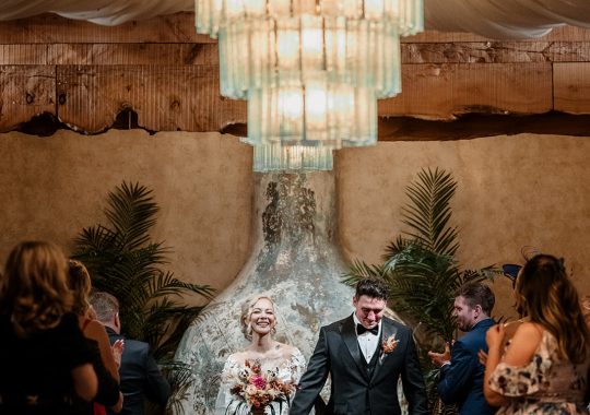 • “Dreamy wedding at Runa Farm, County Durham – rustic charm with a modern boho twist.” • “Bride and groom share a kiss outside Runa Farm’s iconic stone barn – the perfect North East wedding venue.” • “Golden hour wedding photos at Runa Farm – stunning countryside views and soft evening light.” • “Runa Farm wedding ceremony – beautifully lit rustic barn with floral arch and wooden beams.” • “Candid wedding photography at Runa Farm – newlyweds laughing during their reception.” • “Bride walking down the aisle at Runa Farm’s stunning barn venue – a perfect Durham wedding location.” • “Romantic outdoor wedding portraits at Runa Farm – lush countryside setting in County Durham.” • “Runa Farm wedding reception setup – rustic wooden tables, twinkling lights, and elegant floral centerpieces.” • “Newlyweds dancing under fairy lights at Runa Farm’s stunning barn reception space.” • “Groom waiting at the altar inside Runa Farm’s rustic barn – an intimate and stylish wedding venue.” • “Sunset wedding photography at Runa Farm, Durham – countryside charm and natural beauty.” • “Elegant boho bride at Runa Farm – modern wedding dress with a rustic backdrop.” • “Bridal party celebrating outside Runa Farm’s stone barn – relaxed wedding vibes in County Durham.” • “Candlelit wedding reception at Runa Farm – romantic and rustic North East wedding setting.” • “Bride and groom strolling through the scenic grounds of Runa Farm, Durham – perfect for countryside weddings.” • “First dance magic at Runa Farm – newlyweds twirling under twinkling lights in the barn.” • “Runa Farm wedding details – stunning dried flower arrangements and rustic décor inspiration.” • “Confetti moment at Runa Farm – newlyweds celebrating with friends and family in a beautiful countryside setting.” • “Gorgeous wedding breakfast setup at Runa Farm – boho-inspired tablescape with warm rustic charm.” • “Bride and groom embracing outside Runa Farm’s historic stone walls – a picture-perfect Durham wedding venue.”