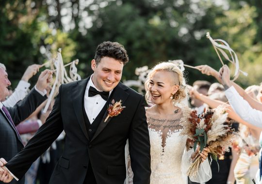 • “Dreamy wedding at Runa Farm, County Durham – rustic charm with a modern boho twist.” • “Bride and groom share a kiss outside Runa Farm’s iconic stone barn – the perfect North East wedding venue.” • “Golden hour wedding photos at Runa Farm – stunning countryside views and soft evening light.” • “Runa Farm wedding ceremony – beautifully lit rustic barn with floral arch and wooden beams.” • “Candid wedding photography at Runa Farm – newlyweds laughing during their reception.” • “Bride walking down the aisle at Runa Farm’s stunning barn venue – a perfect Durham wedding location.” • “Romantic outdoor wedding portraits at Runa Farm – lush countryside setting in County Durham.” • “Runa Farm wedding reception setup – rustic wooden tables, twinkling lights, and elegant floral centerpieces.” • “Newlyweds dancing under fairy lights at Runa Farm’s stunning barn reception space.” • “Groom waiting at the altar inside Runa Farm’s rustic barn – an intimate and stylish wedding venue.” • “Sunset wedding photography at Runa Farm, Durham – countryside charm and natural beauty.” • “Elegant boho bride at Runa Farm – modern wedding dress with a rustic backdrop.” • “Bridal party celebrating outside Runa Farm’s stone barn – relaxed wedding vibes in County Durham.” • “Candlelit wedding reception at Runa Farm – romantic and rustic North East wedding setting.” • “Bride and groom strolling through the scenic grounds of Runa Farm, Durham – perfect for countryside weddings.” • “First dance magic at Runa Farm – newlyweds twirling under twinkling lights in the barn.” • “Runa Farm wedding details – stunning dried flower arrangements and rustic décor inspiration.” • “Confetti moment at Runa Farm – newlyweds celebrating with friends and family in a beautiful countryside setting.” • “Gorgeous wedding breakfast setup at Runa Farm – boho-inspired tablescape with warm rustic charm.” • “Bride and groom embracing outside Runa Farm’s historic stone walls – a picture-perfect Durham wedding venue.”