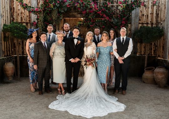 • “Dreamy wedding at Runa Farm, County Durham – rustic charm with a modern boho twist.” • “Bride and groom share a kiss outside Runa Farm’s iconic stone barn – the perfect North East wedding venue.” • “Golden hour wedding photos at Runa Farm – stunning countryside views and soft evening light.” • “Runa Farm wedding ceremony – beautifully lit rustic barn with floral arch and wooden beams.” • “Candid wedding photography at Runa Farm – newlyweds laughing during their reception.” • “Bride walking down the aisle at Runa Farm’s stunning barn venue – a perfect Durham wedding location.” • “Romantic outdoor wedding portraits at Runa Farm – lush countryside setting in County Durham.” • “Runa Farm wedding reception setup – rustic wooden tables, twinkling lights, and elegant floral centerpieces.” • “Newlyweds dancing under fairy lights at Runa Farm’s stunning barn reception space.” • “Groom waiting at the altar inside Runa Farm’s rustic barn – an intimate and stylish wedding venue.” • “Sunset wedding photography at Runa Farm, Durham – countryside charm and natural beauty.” • “Elegant boho bride at Runa Farm – modern wedding dress with a rustic backdrop.” • “Bridal party celebrating outside Runa Farm’s stone barn – relaxed wedding vibes in County Durham.” • “Candlelit wedding reception at Runa Farm – romantic and rustic North East wedding setting.” • “Bride and groom strolling through the scenic grounds of Runa Farm, Durham – perfect for countryside weddings.” • “First dance magic at Runa Farm – newlyweds twirling under twinkling lights in the barn.” • “Runa Farm wedding details – stunning dried flower arrangements and rustic décor inspiration.” • “Confetti moment at Runa Farm – newlyweds celebrating with friends and family in a beautiful countryside setting.” • “Gorgeous wedding breakfast setup at Runa Farm – boho-inspired tablescape with warm rustic charm.” • “Bride and groom embracing outside Runa Farm’s historic stone walls – a picture-perfect Durham wedding venue.”