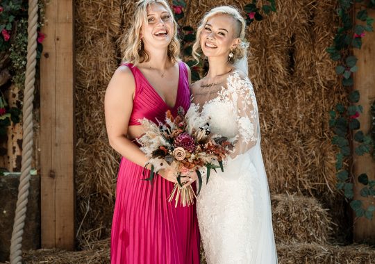 • “Dreamy wedding at Runa Farm, County Durham – rustic charm with a modern boho twist.” • “Bride and groom share a kiss outside Runa Farm’s iconic stone barn – the perfect North East wedding venue.” • “Golden hour wedding photos at Runa Farm – stunning countryside views and soft evening light.” • “Runa Farm wedding ceremony – beautifully lit rustic barn with floral arch and wooden beams.” • “Candid wedding photography at Runa Farm – newlyweds laughing during their reception.” • “Bride walking down the aisle at Runa Farm’s stunning barn venue – a perfect Durham wedding location.” • “Romantic outdoor wedding portraits at Runa Farm – lush countryside setting in County Durham.” • “Runa Farm wedding reception setup – rustic wooden tables, twinkling lights, and elegant floral centerpieces.” • “Newlyweds dancing under fairy lights at Runa Farm’s stunning barn reception space.” • “Groom waiting at the altar inside Runa Farm’s rustic barn – an intimate and stylish wedding venue.” • “Sunset wedding photography at Runa Farm, Durham – countryside charm and natural beauty.” • “Elegant boho bride at Runa Farm – modern wedding dress with a rustic backdrop.” • “Bridal party celebrating outside Runa Farm’s stone barn – relaxed wedding vibes in County Durham.” • “Candlelit wedding reception at Runa Farm – romantic and rustic North East wedding setting.” • “Bride and groom strolling through the scenic grounds of Runa Farm, Durham – perfect for countryside weddings.” • “First dance magic at Runa Farm – newlyweds twirling under twinkling lights in the barn.” • “Runa Farm wedding details – stunning dried flower arrangements and rustic décor inspiration.” • “Confetti moment at Runa Farm – newlyweds celebrating with friends and family in a beautiful countryside setting.” • “Gorgeous wedding breakfast setup at Runa Farm – boho-inspired tablescape with warm rustic charm.” • “Bride and groom embracing outside Runa Farm’s historic stone walls – a picture-perfect Durham wedding venue.”