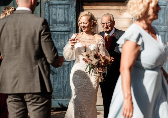 • “Romantic barn wedding at Runa Farm, County Durham – fairy lights, rustic beams, and a cozy atmosphere.” • “Bride and groom share a just-married kiss in front of Runa Farm’s stunning stone barn.” • “Runa Farm wedding photography – dreamy countryside setting with golden hour light.” • “Stylish boho wedding at Runa Farm – pampas grass, dried florals, and rustic charm.” • “Bride walking through Runa Farm’s gorgeous courtyard – perfect for a relaxed North East wedding.” • “Emotional wedding vows inside Runa Farm’s rustic-chic barn ceremony space.” • “Newlyweds celebrating outside Runa Farm’s historic stone walls – perfect for a Durham countryside wedding.” • “First dance under twinkling lights at Runa Farm – a magical wedding reception moment.” • “Sunset couple portraits at Runa Farm, Durham – capturing the romance of a countryside wedding.” • “Groom getting ready at Runa Farm – stylish and rustic pre-wedding moments.” • “Bridesmaids cheering as the bride arrives at Runa Farm – a fun wedding morning moment.” • “Rustic wedding décor at Runa Farm – elegant tablescape with candles, dried flowers, and wooden details.” • “Outdoor wedding drinks reception at Runa Farm – newlyweds mingling with guests in the sunshine.” • “Confetti shower moment at Runa Farm – the perfect candid wedding photo in County Durham.” • “Bridal entrance at Runa Farm’s rustic barn ceremony space – a stunning moment captured.” • “Fun and relaxed wedding reception at Runa Farm – guests dancing the night away under fairy lights.” • “Boho wedding dress inspiration at Runa Farm – bride in