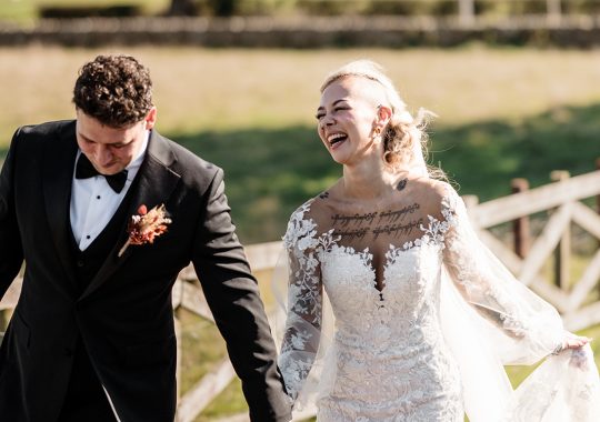 • “Romantic barn wedding at Runa Farm, County Durham – fairy lights, rustic beams, and a cozy atmosphere.” • “Bride and groom share a just-married kiss in front of Runa Farm’s stunning stone barn.” • “Runa Farm wedding photography – dreamy countryside setting with golden hour light.” • “Stylish boho wedding at Runa Farm – pampas grass, dried florals, and rustic charm.” • “Bride walking through Runa Farm’s gorgeous courtyard – perfect for a relaxed North East wedding.” • “Emotional wedding vows inside Runa Farm’s rustic-chic barn ceremony space.” • “Newlyweds celebrating outside Runa Farm’s historic stone walls – perfect for a Durham countryside wedding.” • “First dance under twinkling lights at Runa Farm – a magical wedding reception moment.” • “Sunset couple portraits at Runa Farm, Durham – capturing the romance of a countryside wedding.” • “Groom getting ready at Runa Farm – stylish and rustic pre-wedding moments.” • “Bridesmaids cheering as the bride arrives at Runa Farm – a fun wedding morning moment.” • “Rustic wedding décor at Runa Farm – elegant tablescape with candles, dried flowers, and wooden details.” • “Outdoor wedding drinks reception at Runa Farm – newlyweds mingling with guests in the sunshine.” • “Confetti shower moment at Runa Farm – the perfect candid wedding photo in County Durham.” • “Bridal entrance at Runa Farm’s rustic barn ceremony space – a stunning moment captured.” • “Fun and relaxed wedding reception at Runa Farm – guests dancing the night away under fairy lights.” • “Boho wedding dress inspiration at Runa Farm – bride in