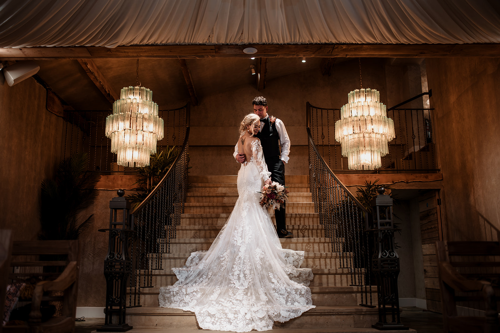 • “Bride and groom standing hand in hand outside Runa Farm’s rustic stone barn – a perfect Durham wedding venue.” • “Candid wedding moment at Runa Farm – newlyweds laughing together under twinkling lights.” • “Elegant boho wedding dress at Runa Farm – bride posing against the venue’s countryside backdrop.” • “Runa Farm wedding setup – long wooden tables, rustic décor, and soft candlelight for a romantic reception.” • “Sunset wedding portraits at Runa Farm – golden hour glow over the rolling Durham countryside.” • “Stylish groom at Runa Farm – a modern take on rustic wedding fashion.” • “The moment they said ‘I do’ – bride and groom exchanging vows in Runa Farm’s barn ceremony space.” • “Runa Farm wedding celebrations – guests raising a toast in a beautifully styled barn reception.” • “Newlyweds sharing their first dance at Runa Farm – a magical moment under fairy lights.” • “Fun wedding party portraits at Runa Farm – bridesmaids and groomsmen celebrating in the countryside.” • “Beautiful wedding bouquet at Runa Farm – dried florals, soft pastels, and rustic charm.” • “Relaxed wedding morning at Runa Farm – bride enjoying a quiet moment before the ceremony.” • “Outdoor wedding drinks reception at Runa Farm – couples and guests enjoying the sunshine and countryside views.” • “Romantic countryside wedding at Runa Farm – couple walking through lush fields at sunset.” • “Runa Farm wedding cake – elegant design with dried flowers and a rustic-luxe finish.” • “Bridal party getting ready at Runa Farm – laughter, champagne, and the perfect pre-wedding moments.” • “Emotional groom watching his bride walk down the aisle at