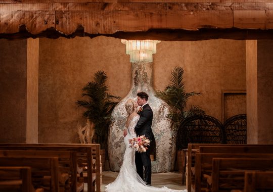 • “Bride and groom standing hand in hand outside Runa Farm’s rustic stone barn – a perfect Durham wedding venue.” • “Candid wedding moment at Runa Farm – newlyweds laughing together under twinkling lights.” • “Elegant boho wedding dress at Runa Farm – bride posing against the venue’s countryside backdrop.” • “Runa Farm wedding setup – long wooden tables, rustic décor, and soft candlelight for a romantic reception.” • “Sunset wedding portraits at Runa Farm – golden hour glow over the rolling Durham countryside.” • “Stylish groom at Runa Farm – a modern take on rustic wedding fashion.” • “The moment they said ‘I do’ – bride and groom exchanging vows in Runa Farm’s barn ceremony space.” • “Runa Farm wedding celebrations – guests raising a toast in a beautifully styled barn reception.” • “Newlyweds sharing their first dance at Runa Farm – a magical moment under fairy lights.” • “Fun wedding party portraits at Runa Farm – bridesmaids and groomsmen celebrating in the countryside.” • “Beautiful wedding bouquet at Runa Farm – dried florals, soft pastels, and rustic charm.” • “Relaxed wedding morning at Runa Farm – bride enjoying a quiet moment before the ceremony.” • “Outdoor wedding drinks reception at Runa Farm – couples and guests enjoying the sunshine and countryside views.” • “Romantic countryside wedding at Runa Farm – couple walking through lush fields at sunset.” • “Runa Farm wedding cake – elegant design with dried flowers and a rustic-luxe finish.” • “Bridal party getting ready at Runa Farm – laughter, champagne, and the perfect pre-wedding moments.” • “Emotional groom watching his bride walk down the aisle at