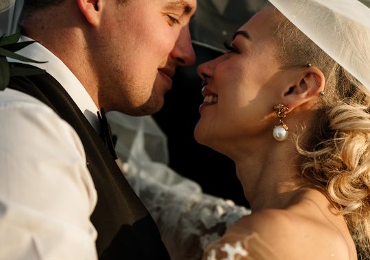 • “Bride and groom standing hand in hand outside Runa Farm’s rustic stone barn – a perfect Durham wedding venue.” • “Candid wedding moment at Runa Farm – newlyweds laughing together under twinkling lights.” • “Elegant boho wedding dress at Runa Farm – bride posing against the venue’s countryside backdrop.” • “Runa Farm wedding setup – long wooden tables, rustic décor, and soft candlelight for a romantic reception.” • “Sunset wedding portraits at Runa Farm – golden hour glow over the rolling Durham countryside.” • “Stylish groom at Runa Farm – a modern take on rustic wedding fashion.” • “The moment they said ‘I do’ – bride and groom exchanging vows in Runa Farm’s barn ceremony space.” • “Runa Farm wedding celebrations – guests raising a toast in a beautifully styled barn reception.” • “Newlyweds sharing their first dance at Runa Farm – a magical moment under fairy lights.” • “Fun wedding party portraits at Runa Farm – bridesmaids and groomsmen celebrating in the countryside.” • “Beautiful wedding bouquet at Runa Farm – dried florals, soft pastels, and rustic charm.” • “Relaxed wedding morning at Runa Farm – bride enjoying a quiet moment before the ceremony.” • “Outdoor wedding drinks reception at Runa Farm – couples and guests enjoying the sunshine and countryside views.” • “Romantic countryside wedding at Runa Farm – couple walking through lush fields at sunset.” • “Runa Farm wedding cake – elegant design with dried flowers and a rustic-luxe finish.” • “Bridal party getting ready at Runa Farm – laughter, champagne, and the perfect pre-wedding moments.” • “Emotional groom watching his bride walk down the aisle at Runa Farm’s intimate barn setting.” • “Boho-inspired wedding styling at Runa Farm – warm tones, pampas grass, and rustic wooden details.” • “Confetti moment at Runa Farm – bride and groom celebrating with family and friends in a joyful shower of petals.” • “Romantic wedding reception at Runa Farm – candlelit tables, rustic beams, and a warm, cozy atmosphere.” • “Bride and groom sharing a private moment outside Runa Farm’s stunning stone architecture.” • “Wedding guests enjoying a relaxed al fresco drinks reception at Runa Farm’s outdoor courtyard.” • “Rustic barn wedding inspiration at Runa Farm – dreamy styling with fairy lights and natural textures.” • “Newlyweds embracing outside Runa Farm’s picturesque countryside backdrop – the perfect Durham wedding setting.” • “Groom waiting at the altar at Runa Farm – the perfect rustic wedding venue for an intimate ceremony.” • “Bridal portraits at Runa Farm – timeless elegance meets countryside charm.” • “Golden hour wedding photography at Runa Farm – romantic sunset portraits of the newlyweds.” • “Sparkler exit at Runa Farm – magical wedding send-off under a starry North East sky.” • “Bride and groom sharing a relaxed moment by Runa Farm’s rustic wooden gates.” • “Romantic first look at Runa Farm – groom’s emotional reaction to seeing his bride.” • “Natural wedding photography at Runa Farm – capturing authentic moments of love and joy.” • “Bridal details at Runa Farm – lace wedding gown, delicate florals, and rustic-chic styling.” • “Outdoor wedding portraits at Runa Farm – capturing the couple in a breathtaking countryside setting.” • “Guests celebrating at Runa Farm wedding reception – joyful candid moments on the dance floor.” • “Modern rustic wedding décor at Runa Farm – beautifully styled tables with earthy tones and fresh flowers.” • “Newlyweds enjoying a quiet moment at Runa Farm’s scenic outdoor spaces.” • “Groom buttoning up his suit before the ceremony at Runa Farm – stylish and relaxed wedding morning.” • “Wedding party group shots at Runa Farm – fun, natural, and full of personality.” • “Intimate wedding dinner setup at Runa Farm – romantic lighting and beautifully arranged tables.”