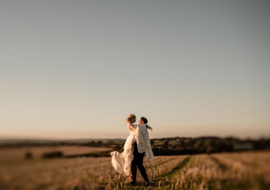 • “Bride and groom standing hand in hand outside Runa Farm’s rustic stone barn – a perfect Durham wedding venue.” • “Candid wedding moment at Runa Farm – newlyweds laughing together under twinkling lights.” • “Elegant boho wedding dress at Runa Farm – bride posing against the venue’s countryside backdrop.” • “Runa Farm wedding setup – long wooden tables, rustic décor, and soft candlelight for a romantic reception.” • “Sunset wedding portraits at Runa Farm – golden hour glow over the rolling Durham countryside.” • “Stylish groom at Runa Farm – a modern take on rustic wedding fashion.” • “The moment they said ‘I do’ – bride and groom exchanging vows in Runa Farm’s barn ceremony space.” • “Runa Farm wedding celebrations – guests raising a toast in a beautifully styled barn reception.” • “Newlyweds sharing their first dance at Runa Farm – a magical moment under fairy lights.” • “Fun wedding party portraits at Runa Farm – bridesmaids and groomsmen celebrating in the countryside.” • “Beautiful wedding bouquet at Runa Farm – dried florals, soft pastels, and rustic charm.” • “Relaxed wedding morning at Runa Farm – bride enjoying a quiet moment before the ceremony.” • “Outdoor wedding drinks reception at Runa Farm – couples and guests enjoying the sunshine and countryside views.” • “Romantic countryside wedding at Runa Farm – couple walking through lush fields at sunset.” • “Runa Farm wedding cake – elegant design with dried flowers and a rustic-luxe finish.” • “Bridal party getting ready at Runa Farm – laughter, champagne, and the perfect pre-wedding moments.” • “Emotional groom watching his bride walk down the aisle at Runa Farm’s intimate barn setting.” • “Boho-inspired wedding styling at Runa Farm – warm tones, pampas grass, and rustic wooden details.” • “Confetti moment at Runa Farm – bride and groom celebrating with family and friends in a joyful shower of petals.” • “Romantic wedding reception at Runa Farm – candlelit tables, rustic beams, and a warm, cozy atmosphere.” • “Bride and groom sharing a private moment outside Runa Farm’s stunning stone architecture.” • “Wedding guests enjoying a relaxed al fresco drinks reception at Runa Farm’s outdoor courtyard.” • “Rustic barn wedding inspiration at Runa Farm – dreamy styling with fairy lights and natural textures.” • “Newlyweds embracing outside Runa Farm’s picturesque countryside backdrop – the perfect Durham wedding setting.” • “Groom waiting at the altar at Runa Farm – the perfect rustic wedding venue for an intimate ceremony.” • “Bridal portraits at Runa Farm – timeless elegance meets countryside charm.” • “Golden hour wedding photography at Runa Farm – romantic sunset portraits of the newlyweds.” • “Sparkler exit at Runa Farm – magical wedding send-off under a starry North East sky.” • “Bride and groom sharing a relaxed moment by Runa Farm’s rustic wooden gates.” • “Romantic first look at Runa Farm – groom’s emotional reaction to seeing his bride.” • “Natural wedding photography at Runa Farm – capturing authentic moments of love and joy.” • “Bridal details at Runa Farm – lace wedding gown, delicate florals, and rustic-chic styling.” • “Outdoor wedding portraits at Runa Farm – capturing the couple in a breathtaking countryside setting.” • “Guests celebrating at Runa Farm wedding reception – joyful candid moments on the dance floor.” • “Modern rustic wedding décor at Runa Farm – beautifully styled tables with earthy tones and fresh flowers.” • “Newlyweds enjoying a quiet moment at Runa Farm’s scenic outdoor spaces.” • “Groom buttoning up his suit before the ceremony at Runa Farm – stylish and relaxed wedding morning.” • “Wedding party group shots at Runa Farm – fun, natural, and full of personality.” • “Intimate wedding dinner setup at Runa Farm – romantic lighting and beautifully arranged tables.”