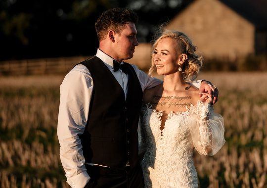 • “Bride and groom standing hand in hand outside Runa Farm’s rustic stone barn – a perfect Durham wedding venue.” • “Candid wedding moment at Runa Farm – newlyweds laughing together under twinkling lights.” • “Elegant boho wedding dress at Runa Farm – bride posing against the venue’s countryside backdrop.” • “Runa Farm wedding setup – long wooden tables, rustic décor, and soft candlelight for a romantic reception.” • “Sunset wedding portraits at Runa Farm – golden hour glow over the rolling Durham countryside.” • “Stylish groom at Runa Farm – a modern take on rustic wedding fashion.” • “The moment they said ‘I do’ – bride and groom exchanging vows in Runa Farm’s barn ceremony space.” • “Runa Farm wedding celebrations – guests raising a toast in a beautifully styled barn reception.” • “Newlyweds sharing their first dance at Runa Farm – a magical moment under fairy lights.” • “Fun wedding party portraits at Runa Farm – bridesmaids and groomsmen celebrating in the countryside.” • “Beautiful wedding bouquet at Runa Farm – dried florals, soft pastels, and rustic charm.” • “Relaxed wedding morning at Runa Farm – bride enjoying a quiet moment before the ceremony.” • “Outdoor wedding drinks reception at Runa Farm – couples and guests enjoying the sunshine and countryside views.” • “Romantic countryside wedding at Runa Farm – couple walking through lush fields at sunset.” • “Runa Farm wedding cake – elegant design with dried flowers and a rustic-luxe finish.” • “Bridal party getting ready at Runa Farm – laughter, champagne, and the perfect pre-wedding moments.” • “Emotional groom watching his bride walk down the aisle at Runa Farm’s intimate barn setting.” • “Boho-inspired wedding styling at Runa Farm – warm tones, pampas grass, and rustic wooden details.” • “Confetti moment at Runa Farm – bride and groom celebrating with family and friends in a joyful shower of petals.” • “Romantic wedding reception at Runa Farm – candlelit tables, rustic beams, and a warm, cozy atmosphere.” • “Bride and groom sharing a private moment outside Runa Farm’s stunning stone architecture.” • “Wedding guests enjoying a relaxed al fresco drinks reception at Runa Farm’s outdoor courtyard.” • “Rustic barn wedding inspiration at Runa Farm – dreamy styling with fairy lights and natural textures.” • “Newlyweds embracing outside Runa Farm’s picturesque countryside backdrop – the perfect Durham wedding setting.” • “Groom waiting at the altar at Runa Farm – the perfect rustic wedding venue for an intimate ceremony.” • “Bridal portraits at Runa Farm – timeless elegance meets countryside charm.” • “Golden hour wedding photography at Runa Farm – romantic sunset portraits of the newlyweds.” • “Sparkler exit at Runa Farm – magical wedding send-off under a starry North East sky.” • “Bride and groom sharing a relaxed moment by Runa Farm’s rustic wooden gates.” • “Romantic first look at Runa Farm – groom’s emotional reaction to seeing his bride.” • “Natural wedding photography at Runa Farm – capturing authentic moments of love and joy.” • “Bridal details at Runa Farm – lace wedding gown, delicate florals, and rustic-chic styling.” • “Outdoor wedding portraits at Runa Farm – capturing the couple in a breathtaking countryside setting.” • “Guests celebrating at Runa Farm wedding reception – joyful candid moments on the dance floor.” • “Modern rustic wedding décor at Runa Farm – beautifully styled tables with earthy tones and fresh flowers.” • “Newlyweds enjoying a quiet moment at Runa Farm’s scenic outdoor spaces.” • “Groom buttoning up his suit before the ceremony at Runa Farm – stylish and relaxed wedding morning.” • “Wedding party group shots at Runa Farm – fun, natural, and full of personality.” • “Intimate wedding dinner setup at Runa Farm – romantic lighting and beautifully arranged tables.”