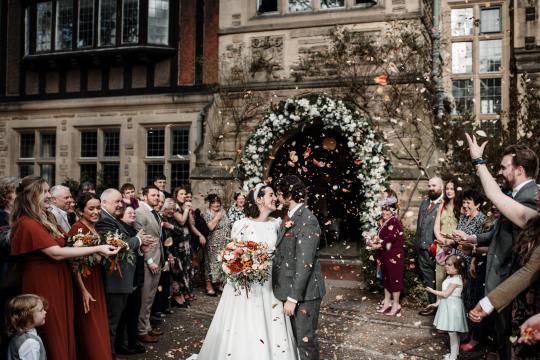 “Romantic wedding ceremony at Jesmond Dene House Hotel – elegant indoor setting with natural light and floral décor.” “Bride and groom share a kiss outside Jesmond Dene House Hotel – picturesque wedding venue in Newcastle’s countryside.” “Intimate wedding reception at Jesmond Dene House Hotel – rustic wooden tables, elegant floral arrangements, and candlelight.” “Outdoor wedding portraits at Jesmond Dene House Hotel – newlyweds surrounded by lush greenery in Jesmond Dene Park.” “Bride and groom walking hand in hand through Jesmond Dene House Hotel’s beautiful gardens – a perfect countryside wedding setting.” “Golden hour wedding photography at Jesmond Dene House Hotel – stunning sunset portraits with natural greenery.” “First dance at Jesmond Dene House Hotel – newlyweds dancing under soft lighting in a romantic and elegant setting.” “Wedding ceremony setup at Jesmond Dene House Hotel – floral arch and rustic décor for an unforgettable wedding.” “Bride and groom celebrating outside Jesmond Dene House Hotel – relaxed and joyful wedding moment in the park.” “Romantic couple portraits at Jesmond Dene House Hotel – intimate wedding photos in front of the charming country house.”