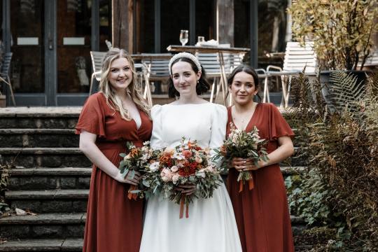 “Romantic wedding ceremony at Jesmond Dene House Hotel – elegant indoor setting with natural light and floral décor.” “Bride and groom share a kiss outside Jesmond Dene House Hotel – picturesque wedding venue in Newcastle’s countryside.” “Intimate wedding reception at Jesmond Dene House Hotel – rustic wooden tables, elegant floral arrangements, and candlelight.” “Outdoor wedding portraits at Jesmond Dene House Hotel – newlyweds surrounded by lush greenery in Jesmond Dene Park.” “Bride and groom walking hand in hand through Jesmond Dene House Hotel’s beautiful gardens – a perfect countryside wedding setting.” “Golden hour wedding photography at Jesmond Dene House Hotel – stunning sunset portraits with natural greenery.” “First dance at Jesmond Dene House Hotel – newlyweds dancing under soft lighting in a romantic and elegant setting.” “Wedding ceremony setup at Jesmond Dene House Hotel – floral arch and rustic décor for an unforgettable wedding.” “Bride and groom celebrating outside Jesmond Dene House Hotel – relaxed and joyful wedding moment in the park.” “Romantic couple portraits at Jesmond Dene House Hotel – intimate wedding photos in front of the charming country house.”
