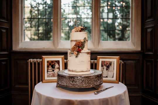 “Romantic wedding ceremony at Jesmond Dene House Hotel – elegant indoor setting with natural light and floral décor.” “Bride and groom share a kiss outside Jesmond Dene House Hotel – picturesque wedding venue in Newcastle’s countryside.” “Intimate wedding reception at Jesmond Dene House Hotel – rustic wooden tables, elegant floral arrangements, and candlelight.” “Outdoor wedding portraits at Jesmond Dene House Hotel – newlyweds surrounded by lush greenery in Jesmond Dene Park.” “Bride and groom walking hand in hand through Jesmond Dene House Hotel’s beautiful gardens – a perfect countryside wedding setting.” “Golden hour wedding photography at Jesmond Dene House Hotel – stunning sunset portraits with natural greenery.” “First dance at Jesmond Dene House Hotel – newlyweds dancing under soft lighting in a romantic and elegant setting.” “Wedding ceremony setup at Jesmond Dene House Hotel – floral arch and rustic décor for an unforgettable wedding.” “Bride and groom celebrating outside Jesmond Dene House Hotel – relaxed and joyful wedding moment in the park.” “Romantic couple portraits at Jesmond Dene House Hotel – intimate wedding photos in front of the charming country house.”