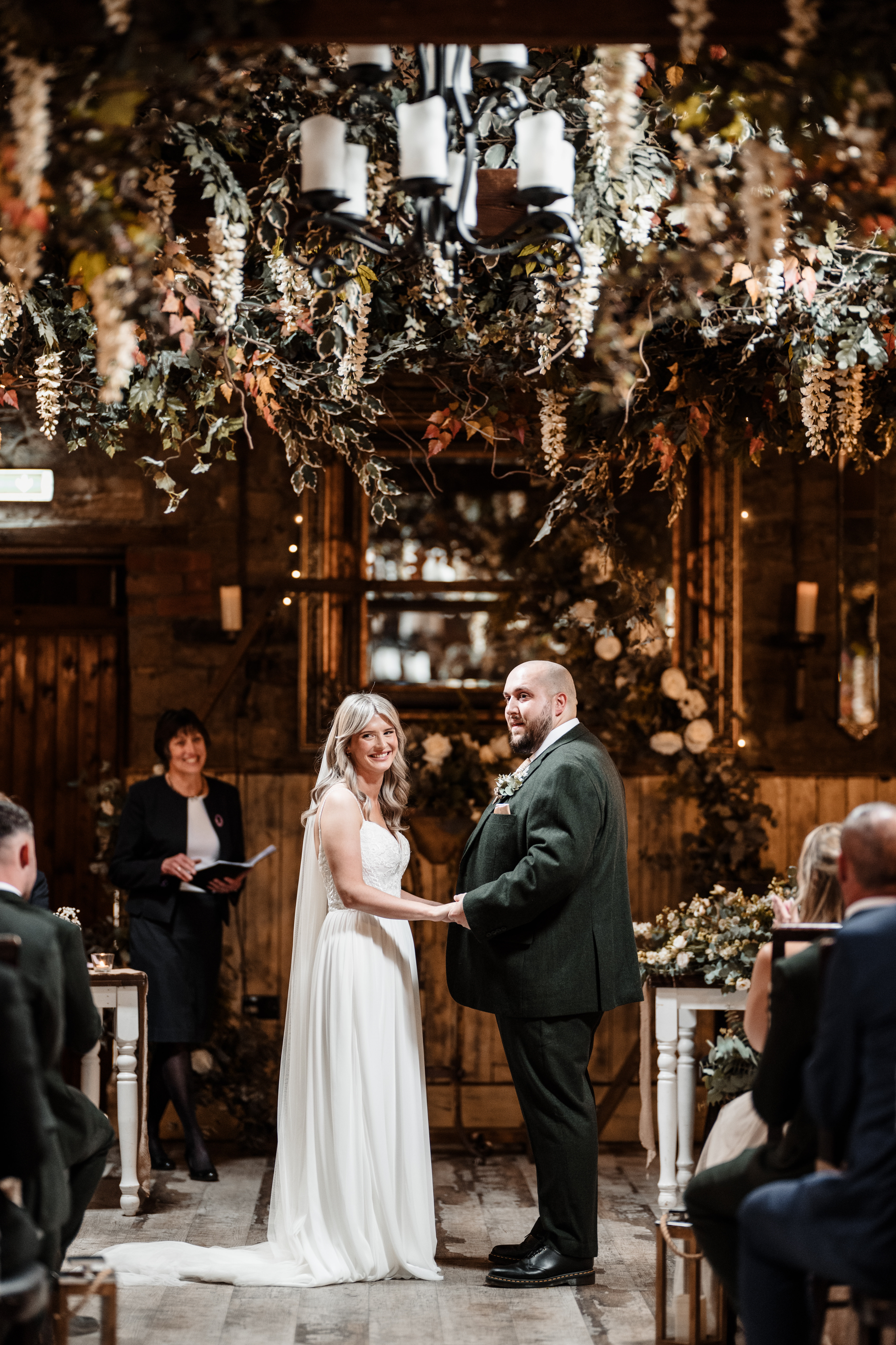 Bride and groom sharing a romantic moment at South Causey Inn wedding venue. The Old Barn at South Causey Inn beautifully decorated for a wedding ceremony. Sunset wedding portraits in the scenic countryside of South Causey Inn. Elegant wedding reception setup inside the Durham Suite at South Causey Inn. Bride getting ready in a cosy South Causey Inn bridal suite before the big day. Couple’s first dance under fairy lights in The Old Barn at South Causey Inn. Newlyweds celebrating with guests at a South Causey Inn wedding reception. Candid wedding photography capturing heartfelt moments at South Causey Inn. Luxury wedding accommodation at South Causey Inn, perfect for newlyweds. South Causey Inn wedding venue surrounded by beautiful gardens and countryside.