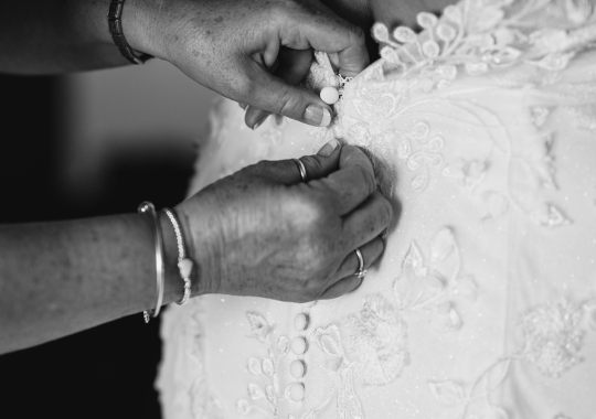 Romantic wedding at Eden Barn, Cumbria – rustic stone barn with fairy lights and countryside views. Bride and groom at Eden Barn, a charming wedding venue in Cumbria with exposed stone walls and wooden beams. Rustic wedding reception at Eden Barn – elegant tablescapes, candlelight, and floral decor in a historic barn setting. Outdoor wedding ceremony at Eden Barn, Cumbria – scenic countryside backdrop with a beautifully styled aisle. Bride and groom sharing their first dance under fairy lights in the atmospheric Eden Barn, Cumbria. Candid wedding photography at Eden Barn – newlyweds enjoying a golden hour moment in the Cumbrian countryside. Intimate wedding dinner at Eden Barn, Cumbria – rustic wooden tables, greenery, and soft lighting. Eden Barn wedding venue – a romantic, family-run barn in the heart of Cumbria’s rolling countryside. Bridal portrait at Eden Barn, Cumbria – stunning wedding dress captured in soft natural light. Groom’s first look reaction at Eden Barn – emotional moment in a rustic barn wedding setting. Evening wedding reception at Eden Barn – cozy, candlelit barn with fairy lights and dancing. Wedding cake display at Eden Barn, Cumbria – beautifully decorated rustic cake with floral accents. Bridal party celebrations at Eden Barn – bridesmaids and groomsmen enjoying the stunning countryside venue. Sunset wedding photography at Eden Barn – breathtaking golden hour shots of the newlyweds. Confetti moment at Eden Barn, Cumbria – joyful wedding guests celebrating outside the historic stone barn. Rustic wedding details at Eden Barn – boho-inspired table settings, wildflowers, and vintage decor. Emotional wedding vows at Eden Barn – heartfelt ceremony in a charming countryside barn setting. Bride and groom walking hand in hand at Eden Barn – natural and relaxed wedding photography. Live wedding band at Eden Barn – guests dancing under the twinkling fairy lights in a rustic barn venue. Luxury barn wedding at Eden Barn, Cumbria – elegant styling meets countryside charm for the perfect day.