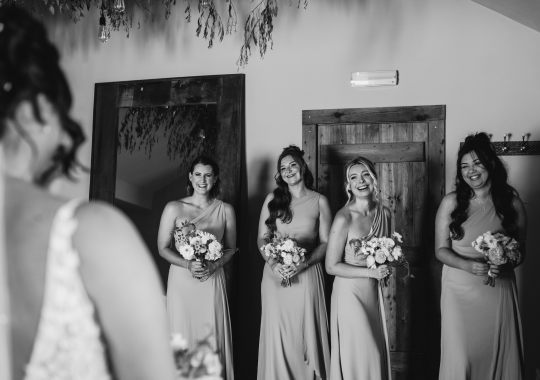 Romantic wedding at Eden Barn, Cumbria – rustic stone barn with fairy lights and countryside views. Bride and groom at Eden Barn, a charming wedding venue in Cumbria with exposed stone walls and wooden beams. Rustic wedding reception at Eden Barn – elegant tablescapes, candlelight, and floral decor in a historic barn setting. Outdoor wedding ceremony at Eden Barn, Cumbria – scenic countryside backdrop with a beautifully styled aisle. Bride and groom sharing their first dance under fairy lights in the atmospheric Eden Barn, Cumbria. Candid wedding photography at Eden Barn – newlyweds enjoying a golden hour moment in the Cumbrian countryside. Intimate wedding dinner at Eden Barn, Cumbria – rustic wooden tables, greenery, and soft lighting. Eden Barn wedding venue – a romantic, family-run barn in the heart of Cumbria’s rolling countryside. Bridal portrait at Eden Barn, Cumbria – stunning wedding dress captured in soft natural light. Groom’s first look reaction at Eden Barn – emotional moment in a rustic barn wedding setting. Evening wedding reception at Eden Barn – cozy, candlelit barn with fairy lights and dancing. Wedding cake display at Eden Barn, Cumbria – beautifully decorated rustic cake with floral accents. Bridal party celebrations at Eden Barn – bridesmaids and groomsmen enjoying the stunning countryside venue. Sunset wedding photography at Eden Barn – breathtaking golden hour shots of the newlyweds. Confetti moment at Eden Barn, Cumbria – joyful wedding guests celebrating outside the historic stone barn. Rustic wedding details at Eden Barn – boho-inspired table settings, wildflowers, and vintage decor. Emotional wedding vows at Eden Barn – heartfelt ceremony in a charming countryside barn setting. Bride and groom walking hand in hand at Eden Barn – natural and relaxed wedding photography. Live wedding band at Eden Barn – guests dancing under the twinkling fairy lights in a rustic barn venue. Luxury barn wedding at Eden Barn, Cumbria – elegant styling meets countryside charm for the perfect day.