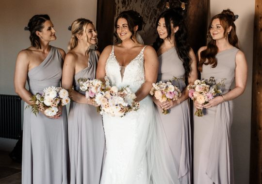Romantic wedding at Eden Barn, Cumbria – rustic stone barn with fairy lights and countryside views. Bride and groom at Eden Barn, a charming wedding venue in Cumbria with exposed stone walls and wooden beams. Rustic wedding reception at Eden Barn – elegant tablescapes, candlelight, and floral decor in a historic barn setting. Outdoor wedding ceremony at Eden Barn, Cumbria – scenic countryside backdrop with a beautifully styled aisle. Bride and groom sharing their first dance under fairy lights in the atmospheric Eden Barn, Cumbria. Candid wedding photography at Eden Barn – newlyweds enjoying a golden hour moment in the Cumbrian countryside. Intimate wedding dinner at Eden Barn, Cumbria – rustic wooden tables, greenery, and soft lighting. Eden Barn wedding venue – a romantic, family-run barn in the heart of Cumbria’s rolling countryside. Bridal portrait at Eden Barn, Cumbria – stunning wedding dress captured in soft natural light. Groom’s first look reaction at Eden Barn – emotional moment in a rustic barn wedding setting. Evening wedding reception at Eden Barn – cozy, candlelit barn with fairy lights and dancing. Wedding cake display at Eden Barn, Cumbria – beautifully decorated rustic cake with floral accents. Bridal party celebrations at Eden Barn – bridesmaids and groomsmen enjoying the stunning countryside venue. Sunset wedding photography at Eden Barn – breathtaking golden hour shots of the newlyweds. Confetti moment at Eden Barn, Cumbria – joyful wedding guests celebrating outside the historic stone barn. Rustic wedding details at Eden Barn – boho-inspired table settings, wildflowers, and vintage decor. Emotional wedding vows at Eden Barn – heartfelt ceremony in a charming countryside barn setting. Bride and groom walking hand in hand at Eden Barn – natural and relaxed wedding photography. Live wedding band at Eden Barn – guests dancing under the twinkling fairy lights in a rustic barn venue. Luxury barn wedding at Eden Barn, Cumbria – elegant styling meets countryside charm for the perfect day.