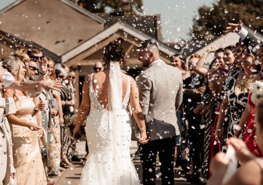 Romantic wedding at Eden Barn, Cumbria – rustic stone barn with fairy lights and countryside views. Bride and groom at Eden Barn, a charming wedding venue in Cumbria with exposed stone walls and wooden beams. Rustic wedding reception at Eden Barn – elegant tablescapes, candlelight, and floral decor in a historic barn setting. Outdoor wedding ceremony at Eden Barn, Cumbria – scenic countryside backdrop with a beautifully styled aisle. Bride and groom sharing their first dance under fairy lights in the atmospheric Eden Barn, Cumbria. Candid wedding photography at Eden Barn – newlyweds enjoying a golden hour moment in the Cumbrian countryside. Intimate wedding dinner at Eden Barn, Cumbria – rustic wooden tables, greenery, and soft lighting. Eden Barn wedding venue – a romantic, family-run barn in the heart of Cumbria’s rolling countryside. Bridal portrait at Eden Barn, Cumbria – stunning wedding dress captured in soft natural light. Groom’s first look reaction at Eden Barn – emotional moment in a rustic barn wedding setting. Evening wedding reception at Eden Barn – cozy, candlelit barn with fairy lights and dancing. Wedding cake display at Eden Barn, Cumbria – beautifully decorated rustic cake with floral accents. Bridal party celebrations at Eden Barn – bridesmaids and groomsmen enjoying the stunning countryside venue. Sunset wedding photography at Eden Barn – breathtaking golden hour shots of the newlyweds. Confetti moment at Eden Barn, Cumbria – joyful wedding guests celebrating outside the historic stone barn. Rustic wedding details at Eden Barn – boho-inspired table settings, wildflowers, and vintage decor. Emotional wedding vows at Eden Barn – heartfelt ceremony in a charming countryside barn setting. Bride and groom walking hand in hand at Eden Barn – natural and relaxed wedding photography. Live wedding band at Eden Barn – guests dancing under the twinkling fairy lights in a rustic barn venue. Luxury barn wedding at Eden Barn, Cumbria – elegant styling meets countryside charm for the perfect day.