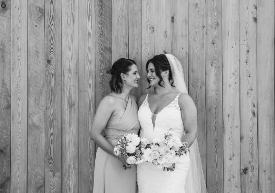 Romantic wedding at Eden Barn, Cumbria – rustic stone barn with fairy lights and countryside views. Bride and groom at Eden Barn, a charming wedding venue in Cumbria with exposed stone walls and wooden beams. Rustic wedding reception at Eden Barn – elegant tablescapes, candlelight, and floral decor in a historic barn setting. Outdoor wedding ceremony at Eden Barn, Cumbria – scenic countryside backdrop with a beautifully styled aisle. Bride and groom sharing their first dance under fairy lights in the atmospheric Eden Barn, Cumbria. Candid wedding photography at Eden Barn – newlyweds enjoying a golden hour moment in the Cumbrian countryside. Intimate wedding dinner at Eden Barn, Cumbria – rustic wooden tables, greenery, and soft lighting. Eden Barn wedding venue – a romantic, family-run barn in the heart of Cumbria’s rolling countryside. Bridal portrait at Eden Barn, Cumbria – stunning wedding dress captured in soft natural light. Groom’s first look reaction at Eden Barn – emotional moment in a rustic barn wedding setting. Evening wedding reception at Eden Barn – cozy, candlelit barn with fairy lights and dancing. Wedding cake display at Eden Barn, Cumbria – beautifully decorated rustic cake with floral accents. Bridal party celebrations at Eden Barn – bridesmaids and groomsmen enjoying the stunning countryside venue. Sunset wedding photography at Eden Barn – breathtaking golden hour shots of the newlyweds. Confetti moment at Eden Barn, Cumbria – joyful wedding guests celebrating outside the historic stone barn. Rustic wedding details at Eden Barn – boho-inspired table settings, wildflowers, and vintage decor. Emotional wedding vows at Eden Barn – heartfelt ceremony in a charming countryside barn setting. Bride and groom walking hand in hand at Eden Barn – natural and relaxed wedding photography. Live wedding band at Eden Barn – guests dancing under the twinkling fairy lights in a rustic barn venue. Luxury barn wedding at Eden Barn, Cumbria – elegant styling meets countryside charm for the perfect day.