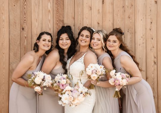 Romantic wedding at Eden Barn, Cumbria – rustic stone barn with fairy lights and countryside views. Bride and groom at Eden Barn, a charming wedding venue in Cumbria with exposed stone walls and wooden beams. Rustic wedding reception at Eden Barn – elegant tablescapes, candlelight, and floral decor in a historic barn setting. Outdoor wedding ceremony at Eden Barn, Cumbria – scenic countryside backdrop with a beautifully styled aisle. Bride and groom sharing their first dance under fairy lights in the atmospheric Eden Barn, Cumbria. Candid wedding photography at Eden Barn – newlyweds enjoying a golden hour moment in the Cumbrian countryside. Intimate wedding dinner at Eden Barn, Cumbria – rustic wooden tables, greenery, and soft lighting. Eden Barn wedding venue – a romantic, family-run barn in the heart of Cumbria’s rolling countryside. Bridal portrait at Eden Barn, Cumbria – stunning wedding dress captured in soft natural light. Groom’s first look reaction at Eden Barn – emotional moment in a rustic barn wedding setting. Evening wedding reception at Eden Barn – cozy, candlelit barn with fairy lights and dancing. Wedding cake display at Eden Barn, Cumbria – beautifully decorated rustic cake with floral accents. Bridal party celebrations at Eden Barn – bridesmaids and groomsmen enjoying the stunning countryside venue. Sunset wedding photography at Eden Barn – breathtaking golden hour shots of the newlyweds. Confetti moment at Eden Barn, Cumbria – joyful wedding guests celebrating outside the historic stone barn. Rustic wedding details at Eden Barn – boho-inspired table settings, wildflowers, and vintage decor. Emotional wedding vows at Eden Barn – heartfelt ceremony in a charming countryside barn setting. Bride and groom walking hand in hand at Eden Barn – natural and relaxed wedding photography. Live wedding band at Eden Barn – guests dancing under the twinkling fairy lights in a rustic barn venue. Luxury barn wedding at Eden Barn, Cumbria – elegant styling meets countryside charm for the perfect day.