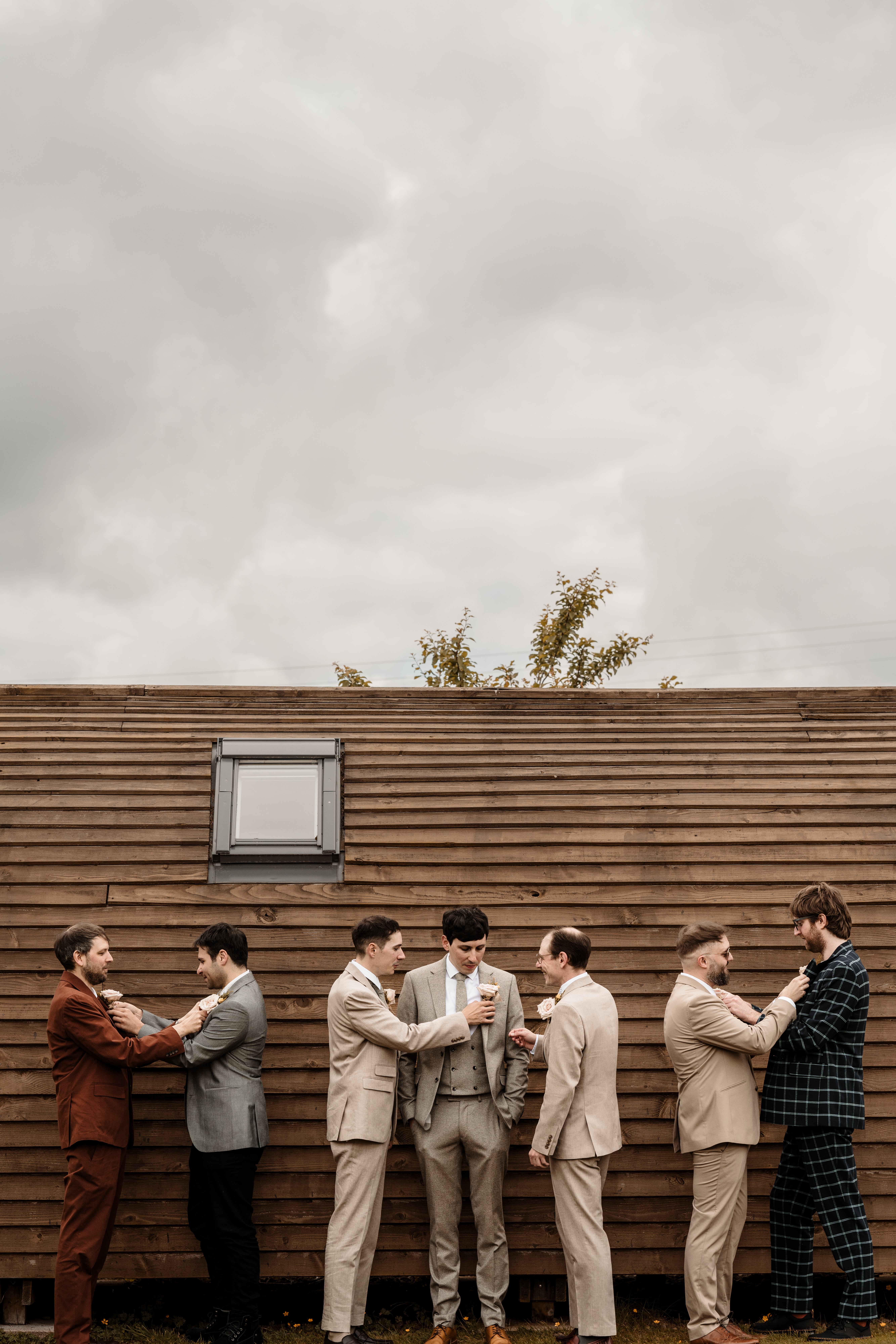 Bride and groom walking hand in hand at Northside Farm wedding venue Romantic countryside wedding photography at Northside Farm, Northumberland Rustic barn wedding reception with fairy lights and wooden beams at Northside Farm Bride and groom sharing a quiet moment outside Northside Farm’s stone barn Golden hour wedding couple portraits at Northside Farm with rolling hills in the background Natural and candid wedding photography at Northside Farm, UK Guests celebrating at a Northside Farm wedding reception inside the barn Bride getting ready inside a shepherd’s hut at Northside Farm wedding venue Couple’s first kiss as newlyweds at Northside Farm’s rustic barn ceremony Emotional first look between bride and groom at Northside Farm, Northumberland