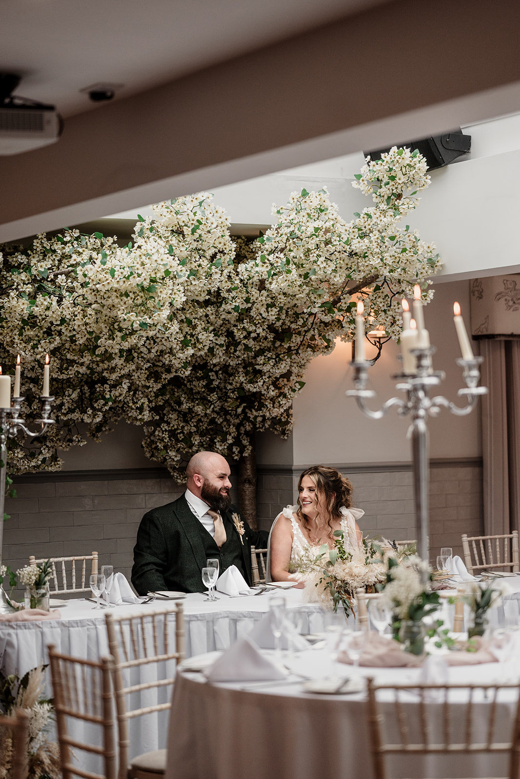 Bride and groom sharing a romantic moment at South Causey Inn wedding venue. The Old Barn at South Causey Inn beautifully decorated for a wedding ceremony. Sunset wedding portraits in the scenic countryside of South Causey Inn. Elegant wedding reception setup inside the Durham Suite at South Causey Inn. Bride getting ready in a cosy South Causey Inn bridal suite before the big day. Couple’s first dance under fairy lights in The Old Barn at South Causey Inn. Newlyweds celebrating with guests at a South Causey Inn wedding reception. Candid wedding photography capturing heartfelt moments at South Causey Inn. Luxury wedding accommodation at South Causey Inn, perfect for newlyweds. South Causey Inn wedding venue surrounded by beautiful gardens and countryside.