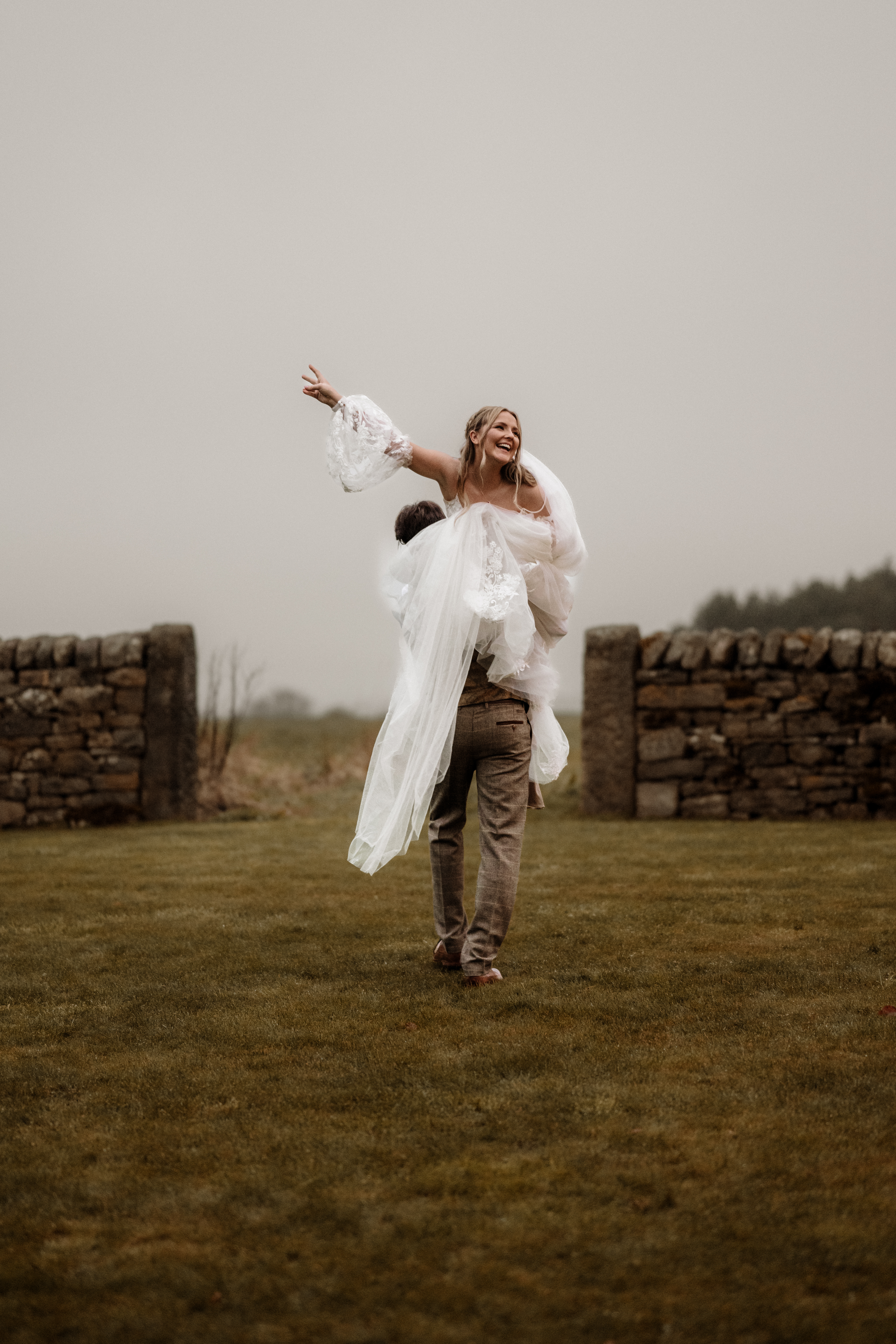 “Bride and groom walking hand in hand through the gardens at Healey Barn – a romantic countryside wedding setting.” “Candlelit wedding breakfast inside Healey Barn – rustic wooden tables with elegant floral arrangements.” “Golden hour couple portraits at Healey Barn – newlyweds embracing against a stunning countryside backdrop.” “Bride twirling in her wedding dress outside Healey Barn – a perfect Northumberland barn wedding moment.” “Groom adjusting his suit before the ceremony at Healey Barn – stylish and relaxed wedding prep.” “Bridal party celebrating outside Healey Barn – bridesmaids and groomsmen laughing in the sunshine.” “Rustic wedding cake display at Healey Barn – a beautiful three-tier cake with floral decorations.” “Newlyweds sharing a quiet moment outside Healey Barn’s stone walls – intimate wedding photography in Northumberland.” “Guests raising a toast at a wedding reception in Healey Barn – joyful celebration under twinkling fairy lights.” “First dance under the beams at Healey Barn – romantic and magical wedding moment.” “Outdoor drinks reception at Healey Barn – guests enjoying champagne in a relaxed countryside setting.” “Bride and groom standing beneath fairy lights at Healey Barn – an enchanting evening wedding portrait.” “Confetti toss moment outside Healey Barn – newlyweds surrounded by love and celebration.” “Bride walking towards Healey Barn’s entrance – a stunning Northumberland wedding venue.” “Lush countryside wedding portraits at Healey Barn – the perfect rural wedding backdrop.” “Romantic evening wedding photography at Healey Barn – warm candlelight and glowing fairy lights.” “Elegant barn wedding styling at Healey Barn – rustic décor with a modern twist.” “Sparkler send-off at Healey Barn – magical wedding exit under the Northumberland night sky.” “Bride and groom laughing together in the gardens of Healey Barn – natural and candid wedding photography.” “Groomsmen sharing a toast before the ceremony at Healey Barn – stylish and fun wedding morning moments.” “Couple sharing a sunset kiss at Healey Barn – dreamy golden hour wedding photography.” “Boho bridal look at Healey Barn – bride with loose waves and a dried flower bouquet.” “Healey Barn wedding breakfast – intimate dining setup with candlelit tables and rustic charm.” “Bride and groom exchanging vows inside Healey Barn – a romantic ceremony moment.” “Elegant wedding dress shot at Healey Barn – lace detail and flowing fabric captured beautifully.” “Guests enjoying an alfresco drinks reception at Healey Barn – relaxed and stylish countryside wedding.” “Healey Barn wedding dance floor – guests celebrating under fairy lights and exposed beams.” “Newlyweds sharing a romantic moment by the firepit at Healey Barn – cozy and intimate wedding vibes.” “Bride and groom embracing against the stone walls of Healey Barn – timeless wedding photography in Northumberland.”