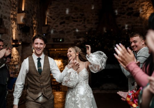 “Bride and groom walking hand in hand through the gardens at Healey Barn – a romantic countryside wedding setting.” “Candlelit wedding breakfast inside Healey Barn – rustic wooden tables with elegant floral arrangements.” “Golden hour couple portraits at Healey Barn – newlyweds embracing against a stunning countryside backdrop.” “Bride twirling in her wedding dress outside Healey Barn – a perfect Northumberland barn wedding moment.” “Groom adjusting his suit before the ceremony at Healey Barn – stylish and relaxed wedding prep.” “Bridal party celebrating outside Healey Barn – bridesmaids and groomsmen laughing in the sunshine.” “Rustic wedding cake display at Healey Barn – a beautiful three-tier cake with floral decorations.” “Newlyweds sharing a quiet moment outside Healey Barn’s stone walls – intimate wedding photography in Northumberland.” “Guests raising a toast at a wedding reception in Healey Barn – joyful celebration under twinkling fairy lights.” “First dance under the beams at Healey Barn – romantic and magical wedding moment.” “Outdoor drinks reception at Healey Barn – guests enjoying champagne in a relaxed countryside setting.” “Bride and groom standing beneath fairy lights at Healey Barn – an enchanting evening wedding portrait.” “Confetti toss moment outside Healey Barn – newlyweds surrounded by love and celebration.” “Bride walking towards Healey Barn’s entrance – a stunning Northumberland wedding venue.” “Lush countryside wedding portraits at Healey Barn – the perfect rural wedding backdrop.” “Romantic evening wedding photography at Healey Barn – warm candlelight and glowing fairy lights.” “Elegant barn wedding styling at Healey Barn – rustic décor with a modern twist.” “Sparkler send-off at Healey Barn – magical wedding exit under the Northumberland night sky.” “Bride and groom laughing together in the gardens of Healey Barn – natural and candid wedding photography.” “Groomsmen sharing a toast before the ceremony at Healey Barn – stylish and fun wedding morning moments.” “Couple sharing a sunset kiss at Healey Barn – dreamy golden hour wedding photography.” “Boho bridal look at Healey Barn – bride with loose waves and a dried flower bouquet.” “Healey Barn wedding breakfast – intimate dining setup with candlelit tables and rustic charm.” “Bride and groom exchanging vows inside Healey Barn – a romantic ceremony moment.” “Elegant wedding dress shot at Healey Barn – lace detail and flowing fabric captured beautifully.” “Guests enjoying an alfresco drinks reception at Healey Barn – relaxed and stylish countryside wedding.” “Healey Barn wedding dance floor – guests celebrating under fairy lights and exposed beams.” “Newlyweds sharing a romantic moment by the firepit at Healey Barn – cozy and intimate wedding vibes.” “Bride and groom embracing against the stone walls of Healey Barn – timeless wedding photography in Northumberland.”
