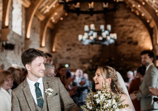 “Romantic wedding ceremony inside Healey Barn, Northumberland – candlelit aisle and rustic stone walls.” “Bride and groom share a kiss outside Healey Barn – a stunning North East barn wedding venue.” “Sunset wedding portraits at Healey Barn – golden hour glow over the Northumberland countryside.” “Rustic wedding reception at Healey Barn – twinkling fairy lights, wooden beams, and a cozy atmosphere.” “Bride walking down the aisle at Healey Barn – intimate ceremony with candlelight and exposed stone walls.” “Outdoor wedding portraits at Healey Barn – newlyweds surrounded by rolling countryside views.” “Groom’s emotional first look at his bride at Healey Barn – a perfect wedding moment captured.” “Elegant barn wedding setup at Healey Barn – rustic wooden tables, floral centerpieces, and romantic lighting.” “Bride and groom celebrating outside Healey Barn – natural and relaxed wedding photography in Northumberland.” “Lively wedding reception at Healey Barn – guests dancing under the rustic beams and fairy lights.” “Romantic first dance at Healey Barn – newlyweds twirling in the candlelit barn reception.” “Bridal prep at Healey Barn – bride getting ready in a stylish, rustic setting.” “Confetti moment at Healey Barn – newlyweds celebrating with guests outside the venue.” “Golden hour wedding photography at Healey Barn – dreamy countryside backdrop with warm sunlight.” “Boho-inspired wedding at Healey Barn – dried florals, rustic décor, and warm candlelight.” “Groom and groomsmen laughing outside Healey Barn – relaxed and fun wedding moments.” “Romantic couple portraits in front of Healey Barn’s stone walls – perfect for a rustic wedding setting.”